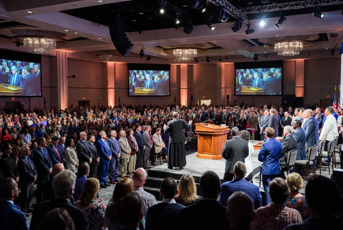 LDS General Conference audience in Salt Lake City listening to speakers